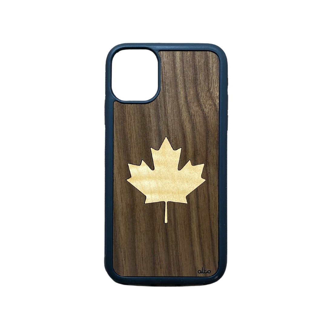 maple leaf inlaid in a darker wood