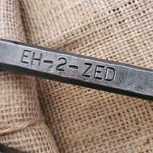 Load image into Gallery viewer, Railway spike bottle opener with Eh-2-Zed stamped into it
