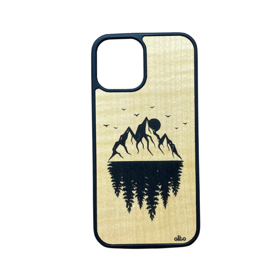 mountains with a reflection of trees sun and birds flying