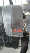 Load image into Gallery viewer, close up look at the red U.S.E.D. red stitching on the front of the bag
